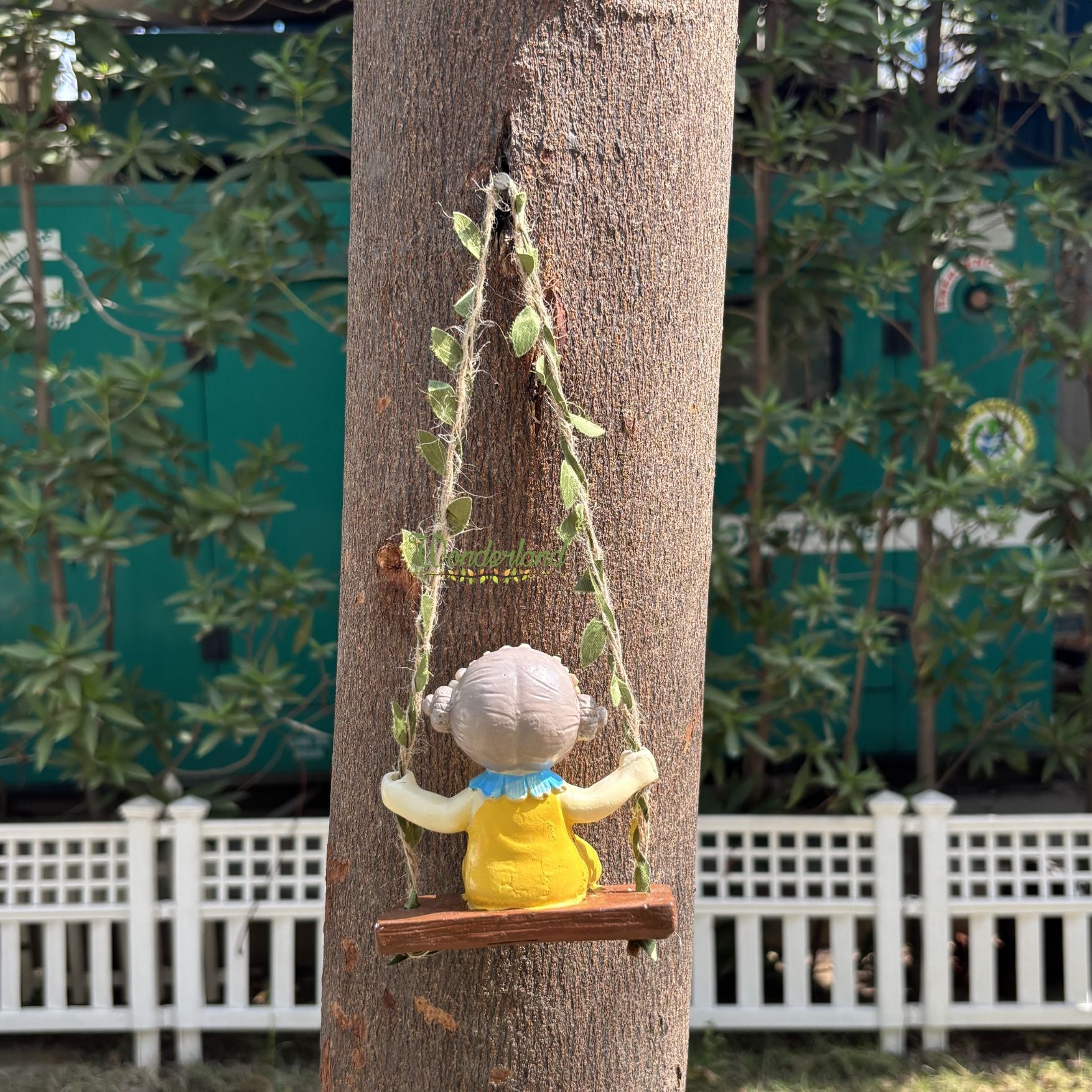 Whimsical Garden Fairy Girl on Swing (yellow)
