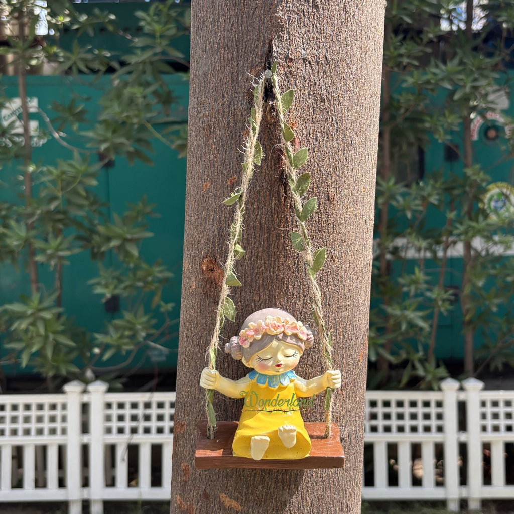 Whimsical Garden Fairy Girl on Swing (yellow)