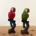Pair of Lifelike Parrot Figurines on Branch Bases – Vibrant Red & Green Parrot Statue ( set of 2)
